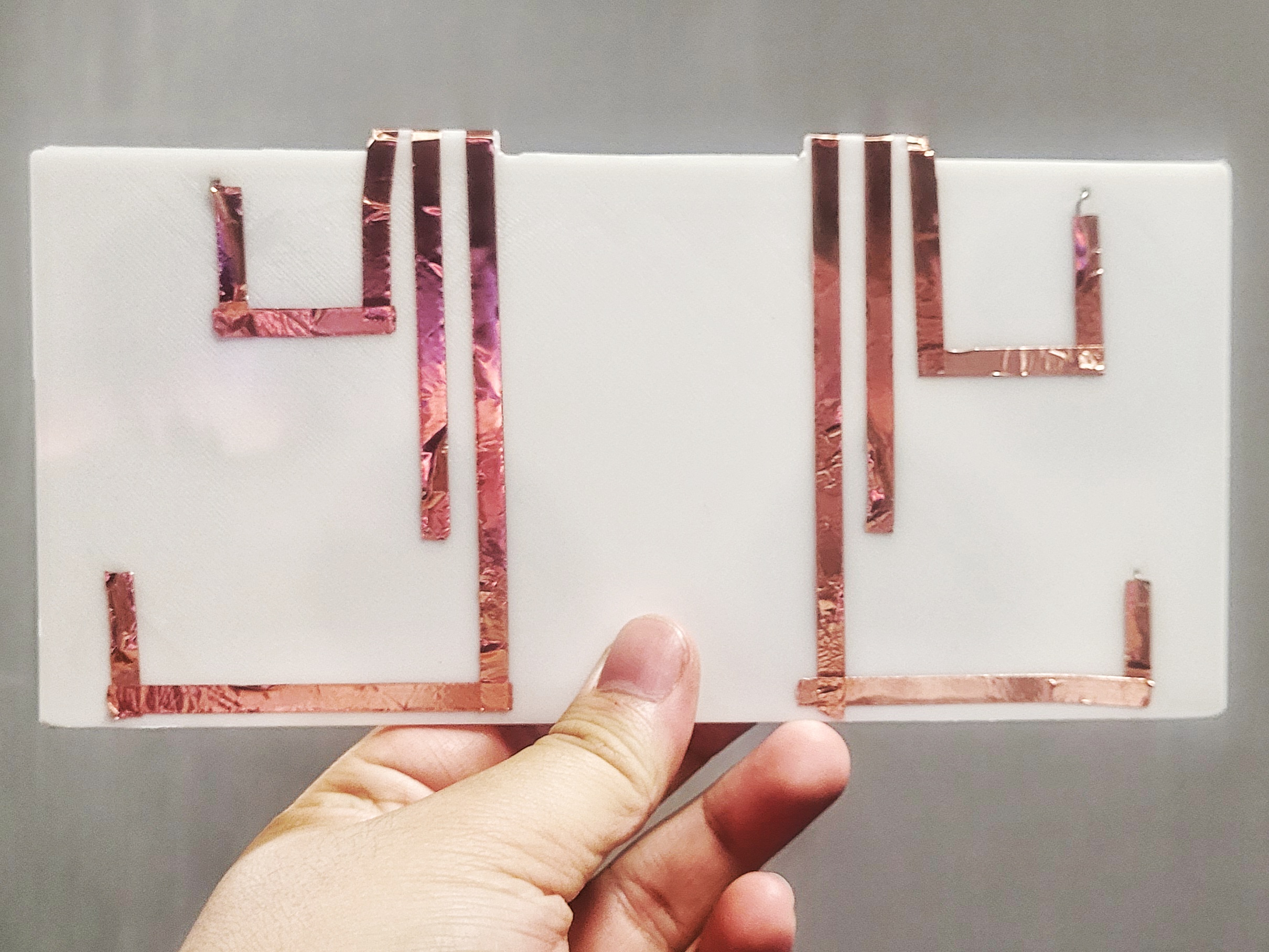 The bottomside of the drumkit showing the copper tape connections